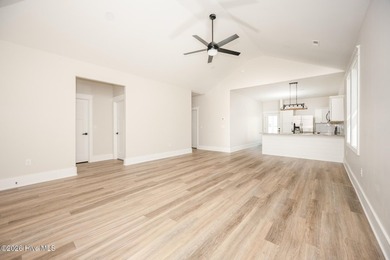 New construction home featuring 3 bedrooms and 2 bathrooms with - photo 4