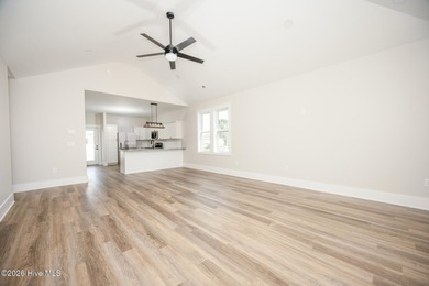 New construction home featuring 3 bedrooms and 2 bathrooms with - photo 5