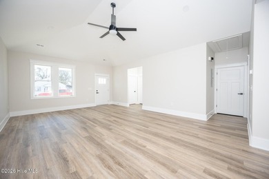 New construction home featuring 3 bedrooms and 2 bathrooms with - photo 6