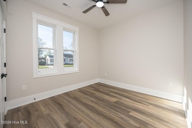 New construction home featuring 3 bedrooms and 2 bathrooms with - photo 7
