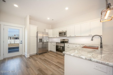 New construction home featuring 3 bedrooms and 2 bathrooms with - photo 8