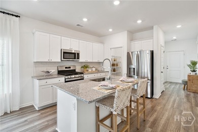 This cozy single-story Palmetto home design features an open - photo 4