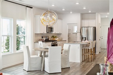 This cozy single-story Palmetto home design features an open - photo 7