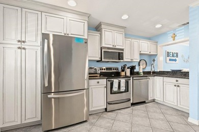 Experience the ultimate beachfront lifestyle in this stunning - photo 3