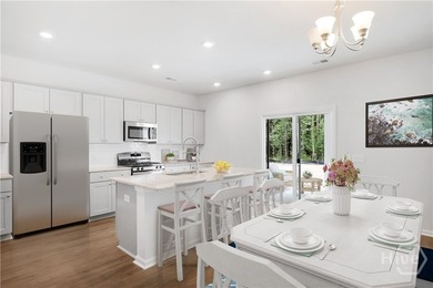 This spacious two-story Sweetgrass home features a contemporary - photo 5