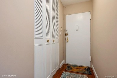 WELCOME HOME TO THIS BEAUTIFUL LIGHT AND BRIGHT RENOVATED CO-OP