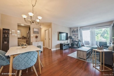 WELCOME HOME TO THIS BEAUTIFUL LIGHT AND BRIGHT RENOVATED CO-OP