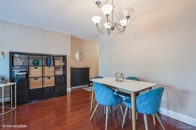 WELCOME HOME TO THIS BEAUTIFUL LIGHT AND BRIGHT RENOVATED CO-OP