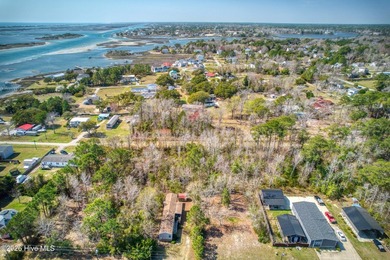 This nearly half-acre wooded lot in Snug Harbor offers the - photo 7