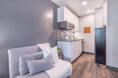 Welcome to this beautifully updated studio in the original - photo 7