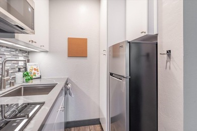 Welcome to this beautifully updated studio in the original - photo 10