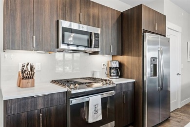 This thoughtfully upgraded River West condo offers modern - photo 12