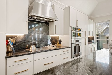 This beautifully renovated two-story home offers 4 bedrooms, 3.5 - photo 14