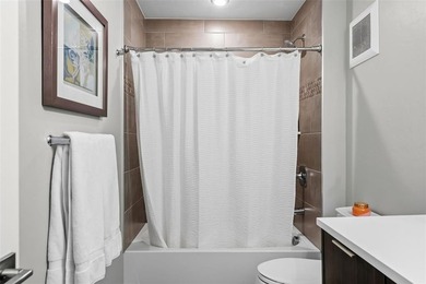 This thoughtfully upgraded River West condo offers modern - photo 20