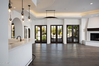 This timeless styled Spanish Colonial home rests in guard gated - photo 11