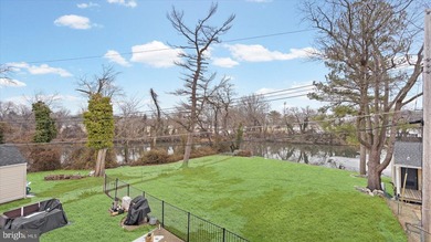 MOTIVATED SELLER; Modern waterfront living meets everyday - photo 11