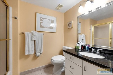 Experience coastal living at Sunchase IV in this spacious - photo 12