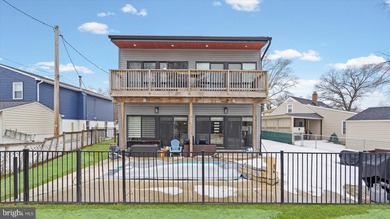 MOTIVATED SELLER; Modern waterfront living meets everyday - photo 12