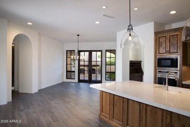 This timeless styled Spanish Colonial home rests in guard gated - photo 16