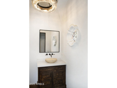This timeless styled Spanish Colonial home rests in guard gated - photo 18