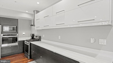 MOTIVATED SELLER; Modern waterfront living meets everyday - photo 26