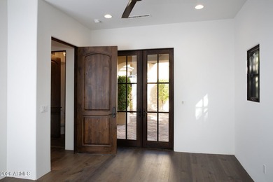 This timeless styled Spanish Colonial home rests in guard gated - photo 28