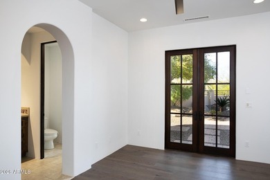 This timeless styled Spanish Colonial home rests in guard gated - photo 31