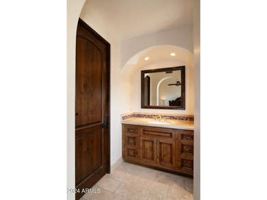 This timeless styled Spanish Colonial home rests in guard gated - photo 33