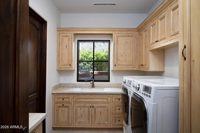 This timeless styled Spanish Colonial home rests in guard gated - photo 34