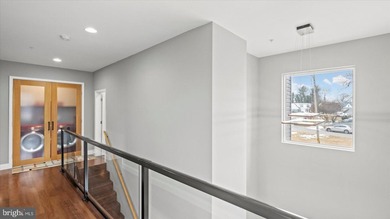 MOTIVATED SELLER; Modern waterfront living meets everyday - photo 34