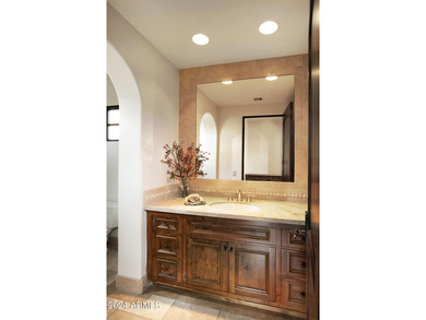 This timeless styled Spanish Colonial home rests in guard gated - photo 41