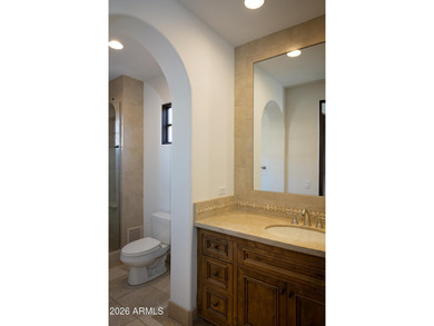 This timeless styled Spanish Colonial home rests in guard gated - photo 42