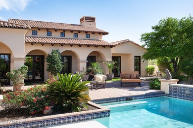 This timeless styled Spanish Colonial home rests in guard gated - photo 44