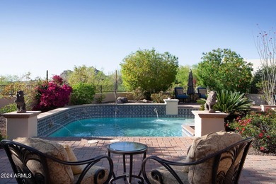 This timeless styled Spanish Colonial home rests in guard gated - photo 49