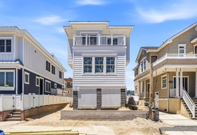 Discover coastal luxury in Stone Harbor with this stunning new - photo 1