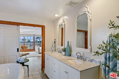 Located in the famed Upper Broad Beach area of Malibu, this - photo 15