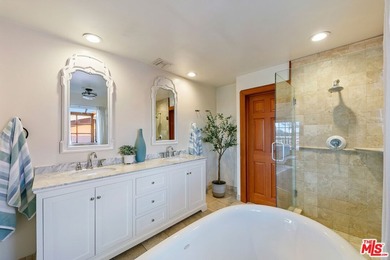 Located in the famed Upper Broad Beach area of Malibu, this - photo 16