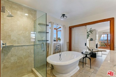 Located in the famed Upper Broad Beach area of Malibu, this - photo 17