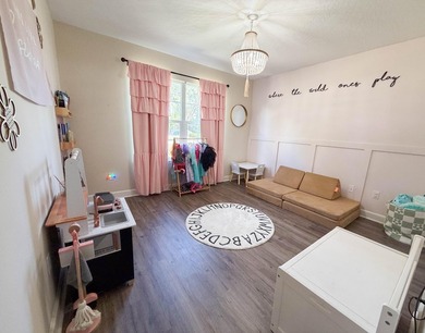 Welcome home to this charming Craftsman-style residence located - photo 15