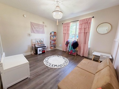 Welcome home to this charming Craftsman-style residence located - photo 16