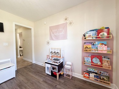 Welcome home to this charming Craftsman-style residence located - photo 17