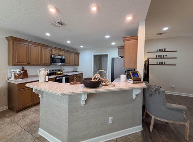 Welcome home to this charming Craftsman-style residence located - photo 25
