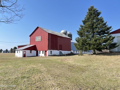 This property features a well-maintained barn roughly 12,000 sq - photo 5