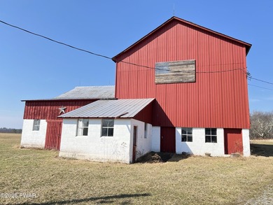 This property features a well-maintained barn roughly 12,000 sq - photo 6