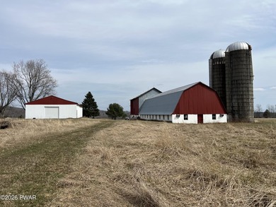 This property features a well-maintained barn roughly 12,000 sq - photo 7