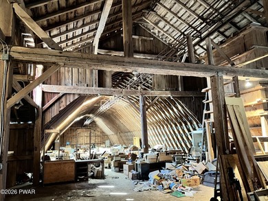 This property features a well-maintained barn roughly 12,000 sq - photo 10