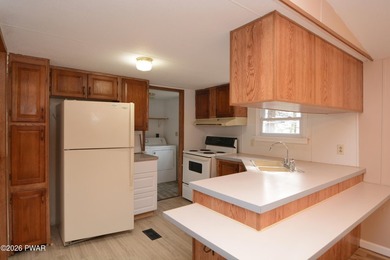 AFFORDABLE ESCAPE AT BEAUTIFUL LAKE WALLENPAUPACK! ONE LEVEL - photo 2