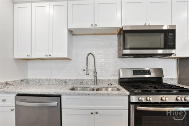 Welcome to this beautifully renovated home, where quality - photo 9