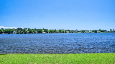 This Lake Home is truly a rare gem! Nestled along 165 Feet of - photo 3