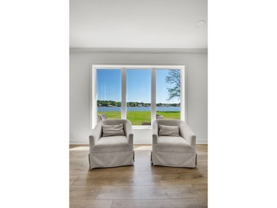 This Lake Home is truly a rare gem! Nestled along 165 Feet of - photo 4